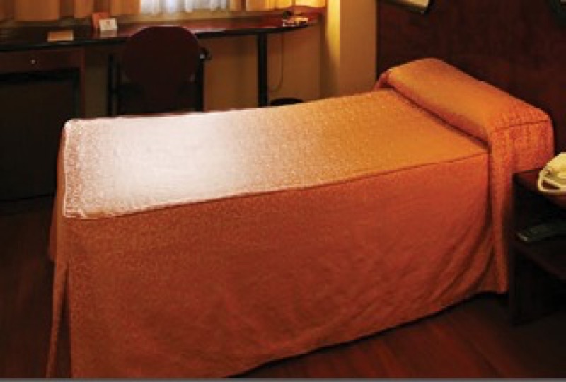 Quarto individual num hotel parceiro